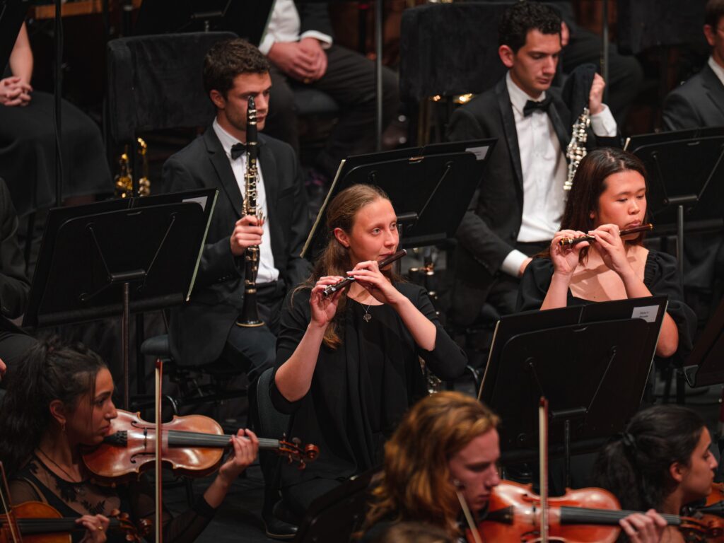 AYO musician Jess Scott performs on piccolo in the Australian Youth Orchestra.