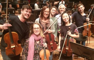 Hayasa Tanaka, a participant of the 2019 AYO Orchestral Development Program poses with members of the MSO Viola section.