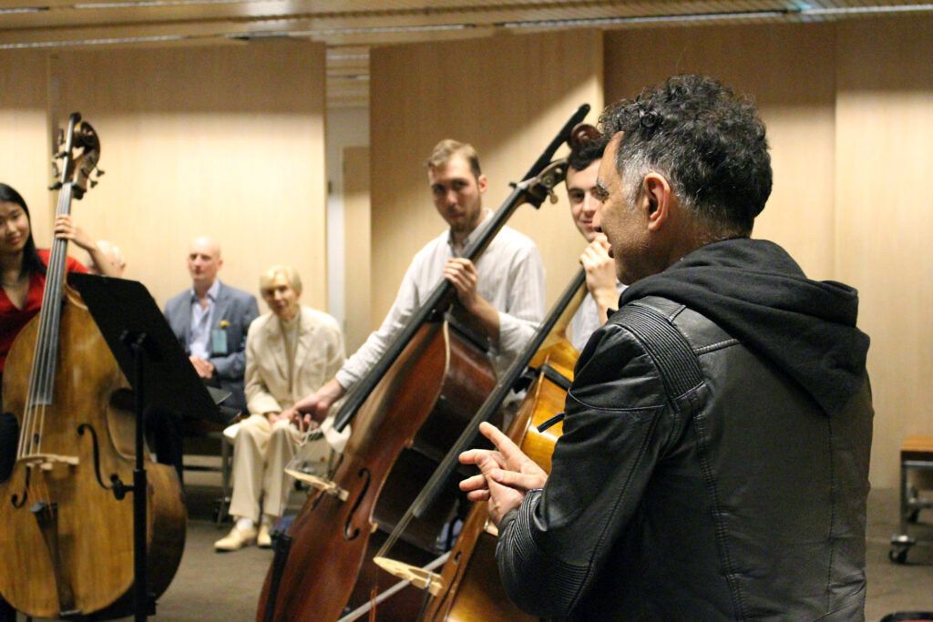 AYO alumnus double bassist Ciro Vigilante takes an AYO masterclass.