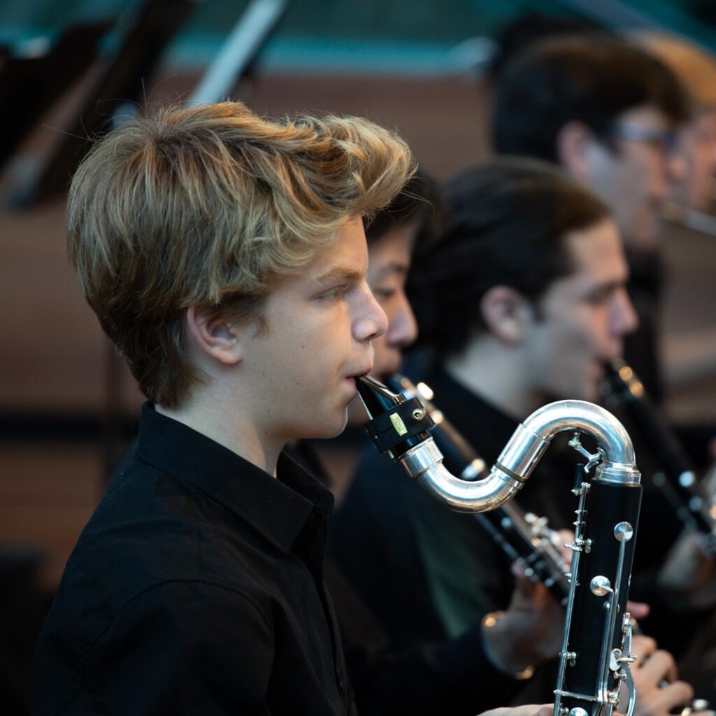 Adam Clennar plays bass clarinet during AYO Young Symphonists concert at Deakin Edge.