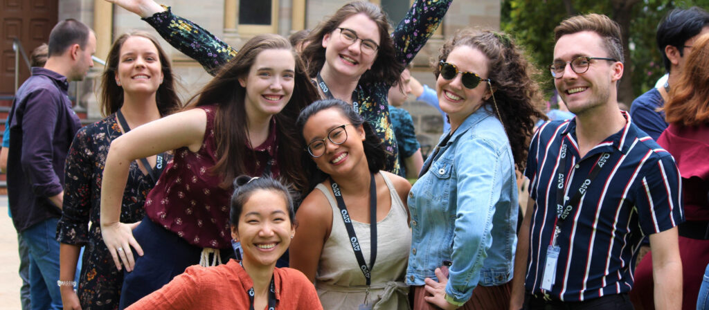 The Orchestral Management cohort from AYO National Music Camp 2020 smile at the camera while striking poses.